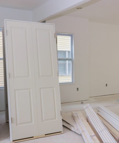 Preparation of interior in new home interior wooden stacker doors a wait installation